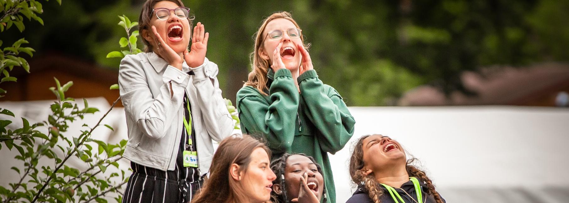Team members cheering together